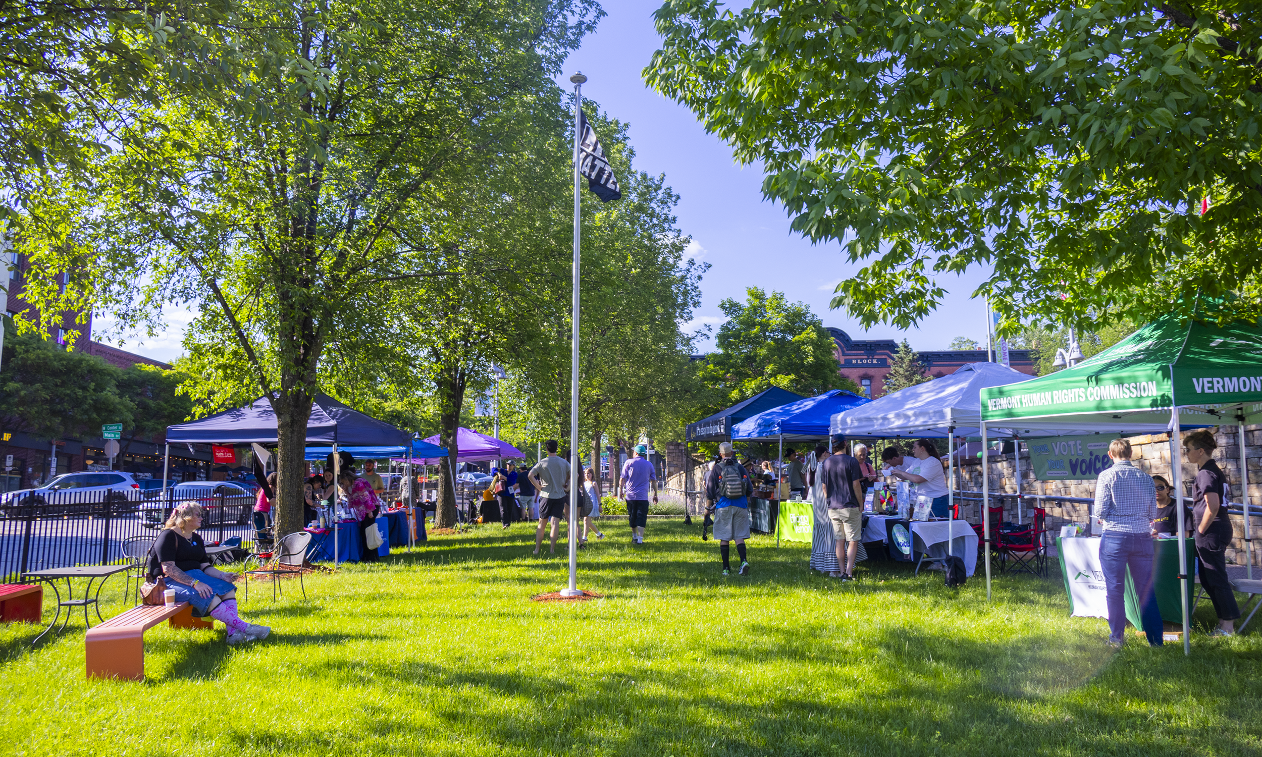 Community members enjoying the tents at Downtown Block Parties